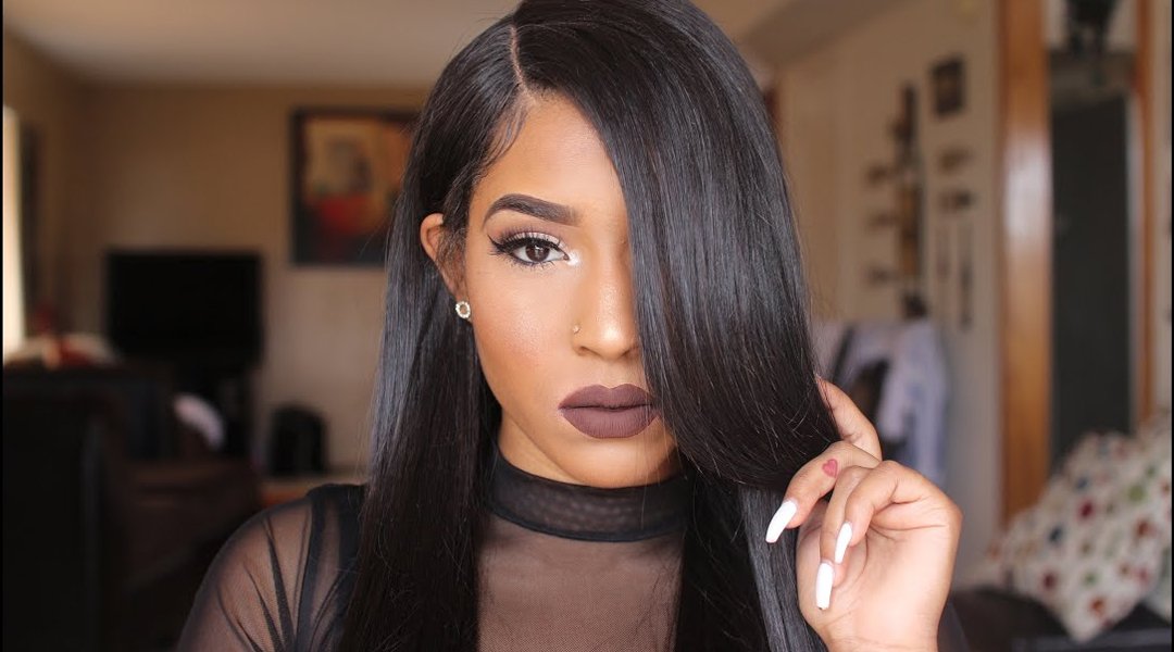 Woman wearing a natural-looking Verona wig with layered hairstyle